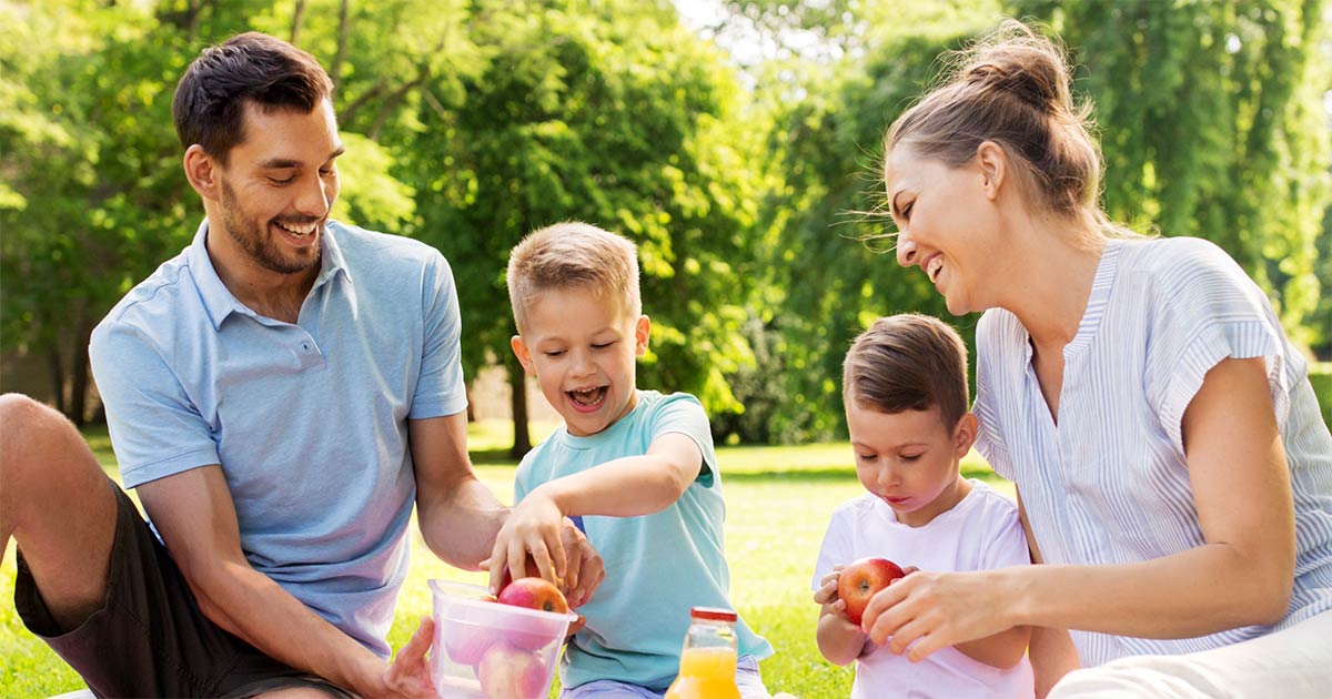 Inpatient Drug & Alcohol Rehab in Phoenix Happy Family Enjoying a Picnic in the Park